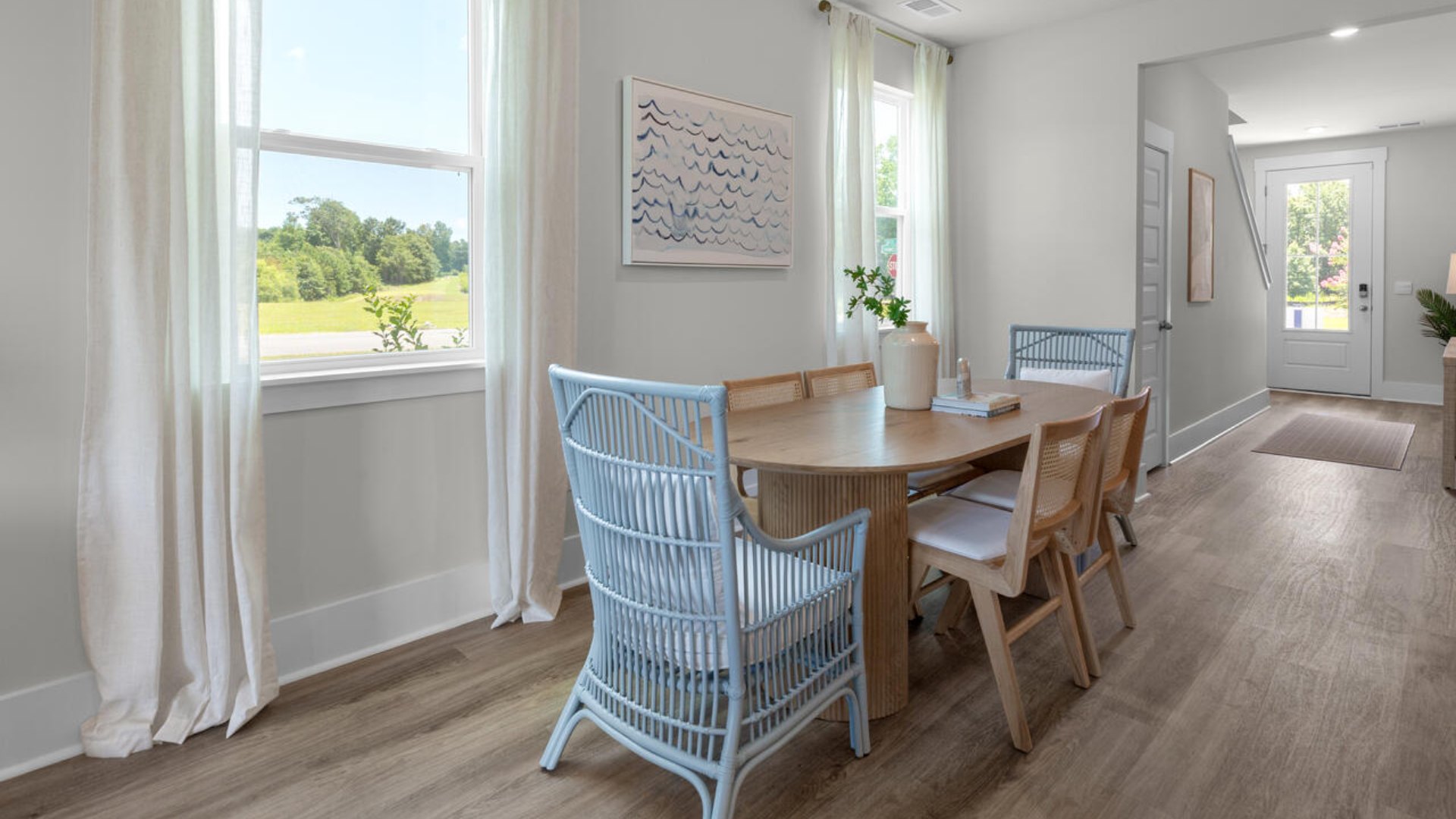 The flexible first floor includes a versatile guest room, office or playroom as well as a full bath across the hall!