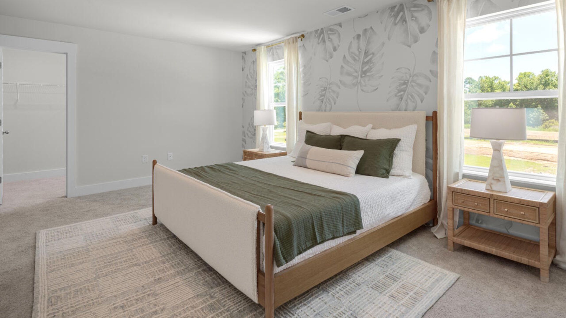 The primary bedroom has its own attached bathroom that features a walk-in closet and all the space you need to get ready in the morning.