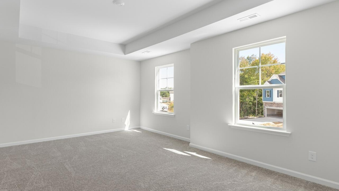 Our renowned Woodstock floor plan features 4 bedrooms, 3 full baths, and spans 2,361 sq. ft. This home provides a guest room or office on the ground floor along with the primary suite and 2 additional bedrooms upstairs.