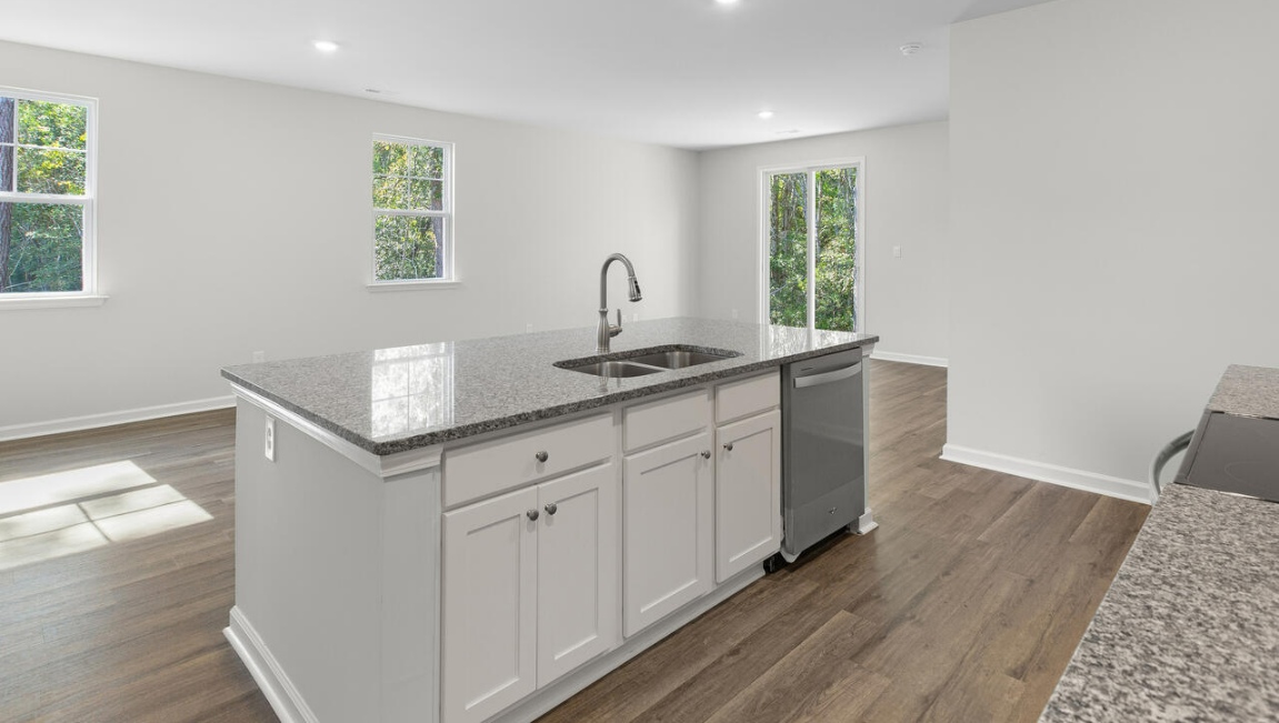 granite countertops in the kitchen, and cultured marble in the bathrooms.