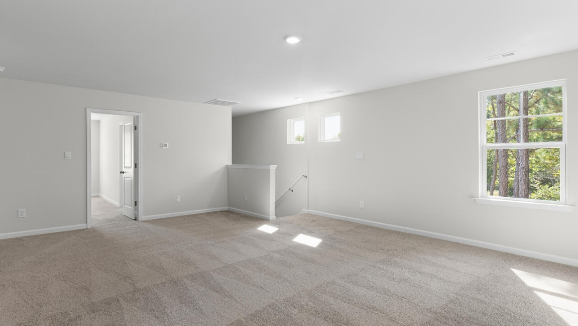 It includes a generous upstairs loft that can serve as an entertainment area, play space, or office.