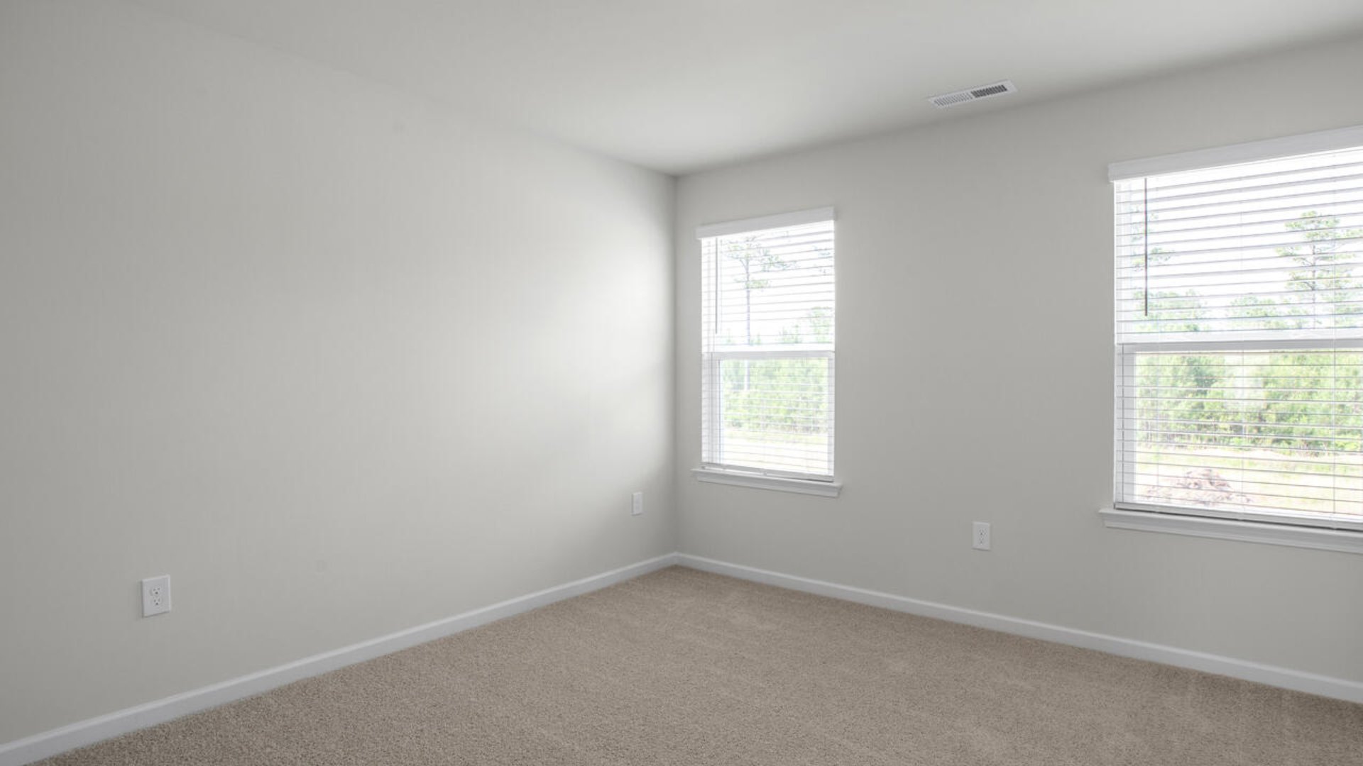 The guest suite on the first floor provides comfort and privacy for visitors, as well as a full bath.