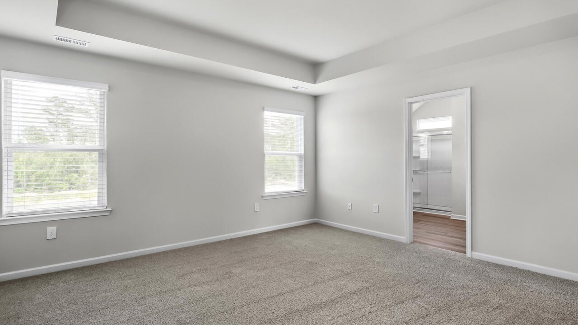 The guest suite on the first floor provides comfort and privacy for visitors, as well as a full bath.