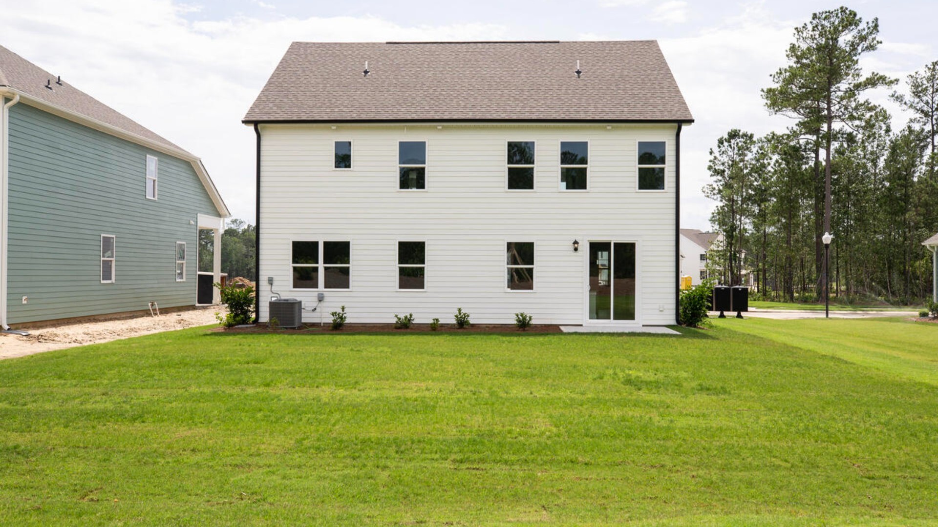 Also located upstairs you'll find a generous bonus room that can be used in a variety of ways as well as 2 other bedrooms! Enjoy the patio perfect for entertaining and enjoying the Carolina nights.