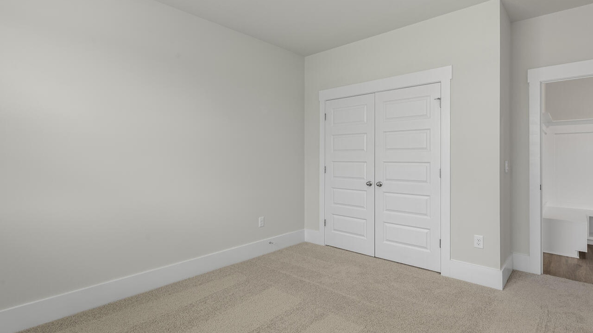 On the first floor, the formal dining room is ideally located next to a spacious open-concept living area and kitchen, allowing for effortless interaction with guests while preparing meals.