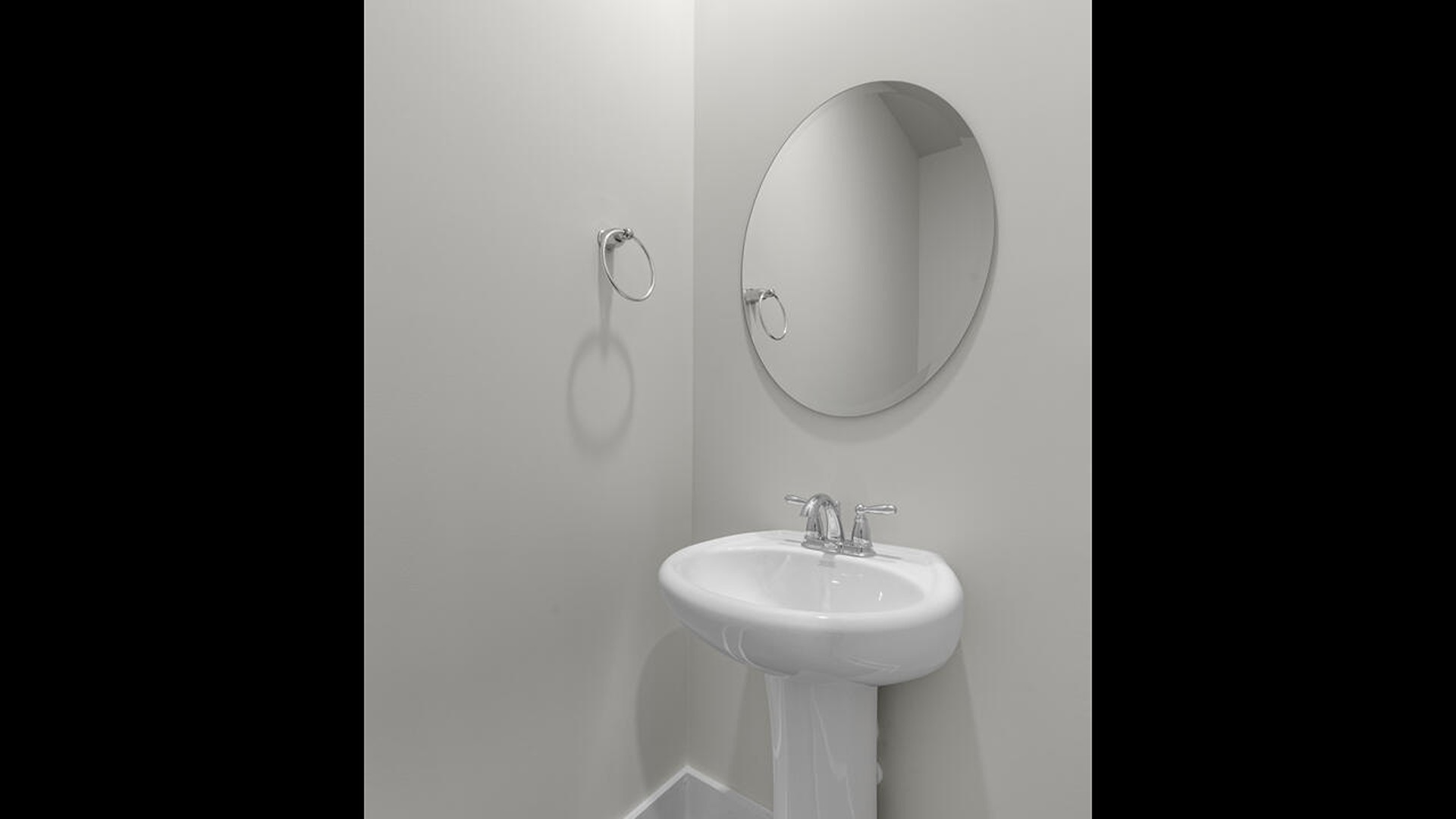 The primary bedroom, conveniently located on the main floor, offers a private retreat with easy access to the living areas.