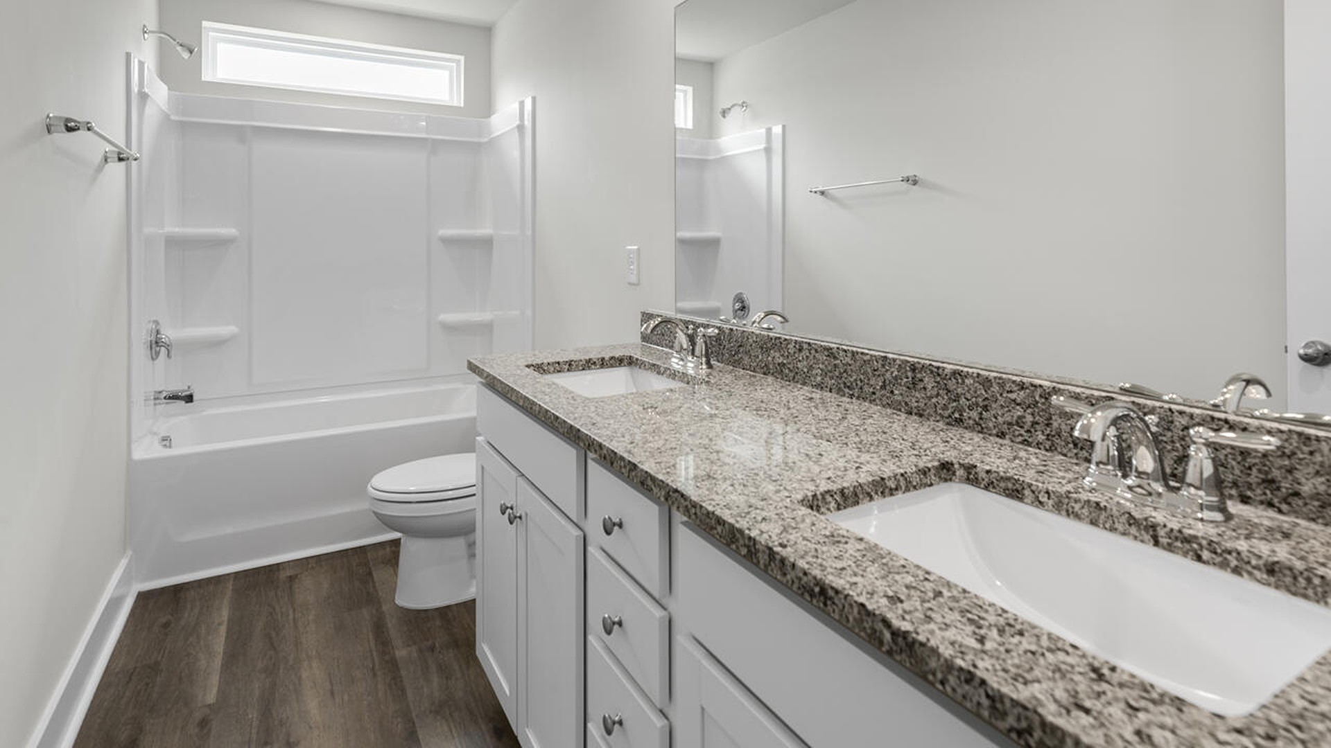 Upstairs you will find four more spacious bedrooms, two full bathrooms, and a great loft space. There are so many ways to customize this home to fit your needs!