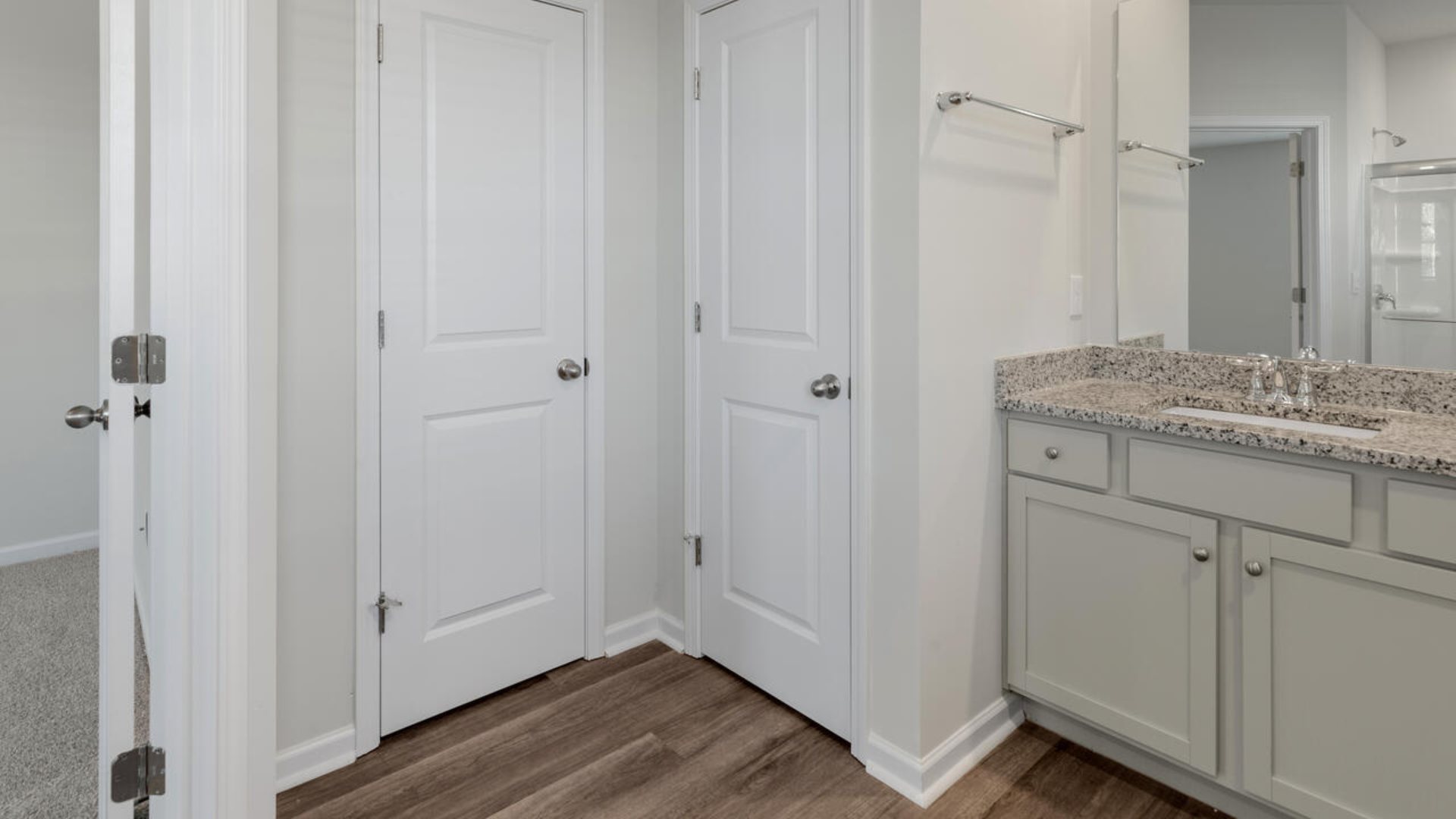 As you enter the home you will find a formal dining room, open concept kitchen and family room with additional seating at the large kitchen island, and a first floor primary bedroom retreat.