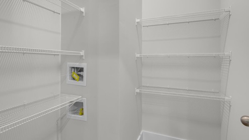 The kitchen features shaker-style cabinets, granite countertops, and stainless steel appliances, which are sure to both turn heads and make meal prep easy. You’ll never be too far from the action with the living and dining area right there.
