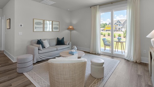 This home provides a guest room or office on the ground floor along with the primary suite and 2 additional bedrooms upstairs. It includes a generous upstairs loft that can serve as an entertainment area, play space, or office. The Woodstock comes with a 2-car garage.