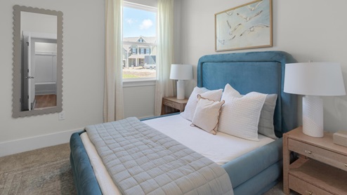 This home provides a guest room or office on the ground floor along with the primary suite and 2 additional bedrooms upstairs. It includes a generous upstairs loft that can serve as an entertainment area, play space, or office. The Woodstock comes with a 2-car garage.