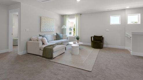 This home provides a guest room or office on the ground floor along with the primary suite and 2 additional bedrooms upstairs. It includes a generous upstairs loft that can serve as an entertainment area, play space, or office. The Woodstock comes with a 2-car garage.