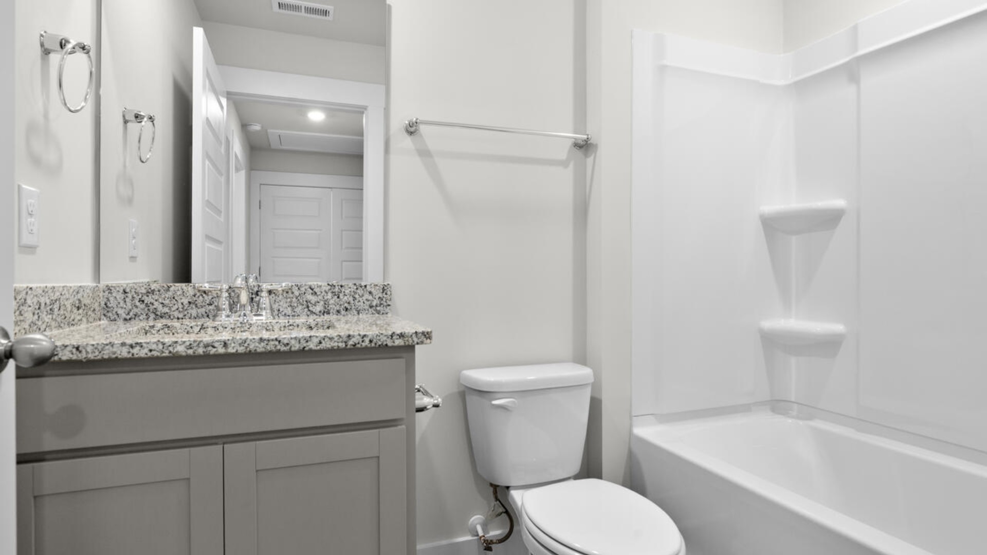 It also includes two additional bedrooms, a shared bathroom, and a laundry room for convenience. In every bedroom you’ll have carpeted floors and a closet in each room.