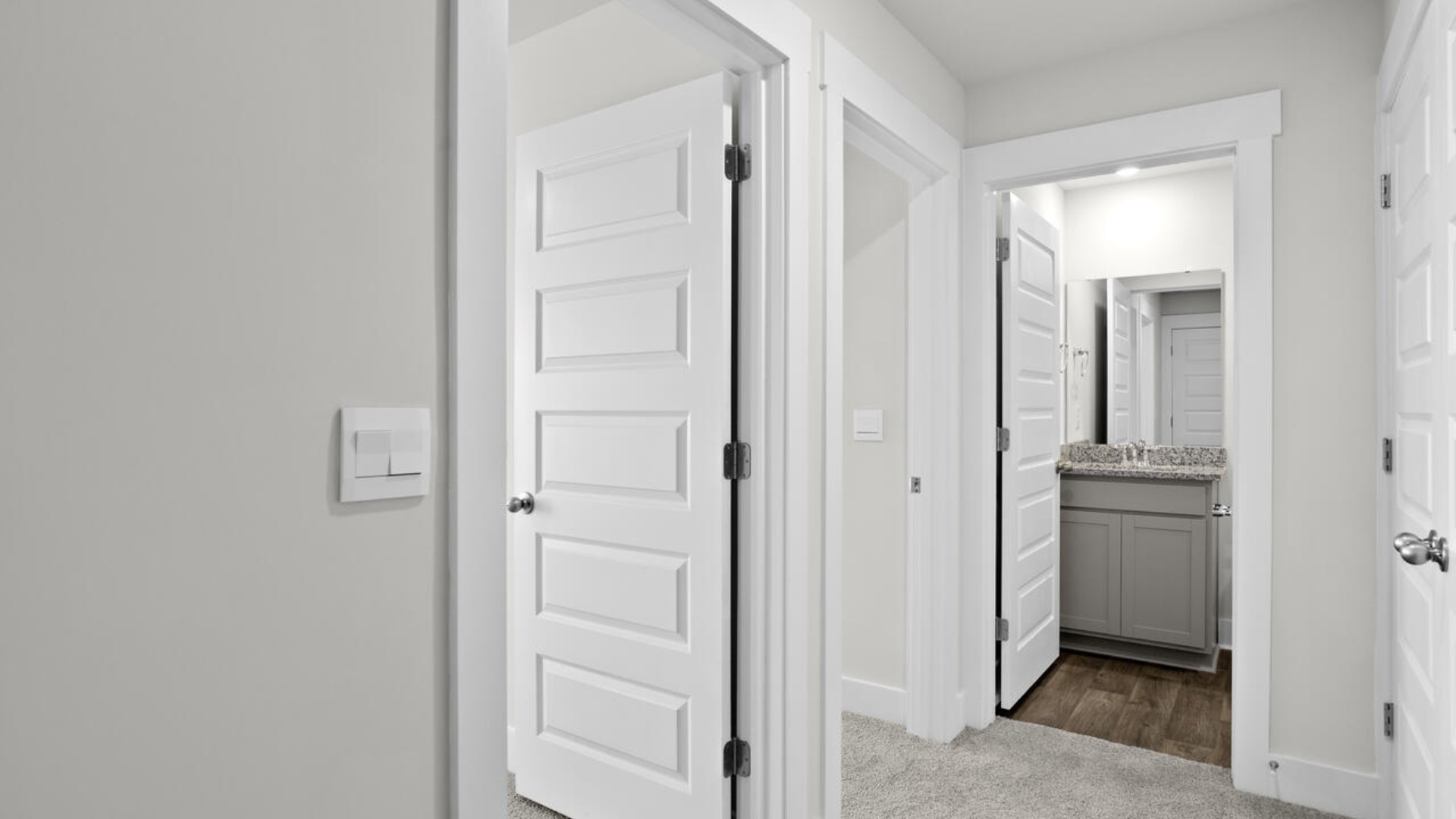 It also includes two additional bedrooms, a shared bathroom, and a laundry room for convenience. In every bedroom you’ll have carpeted floors and a closet in each room.