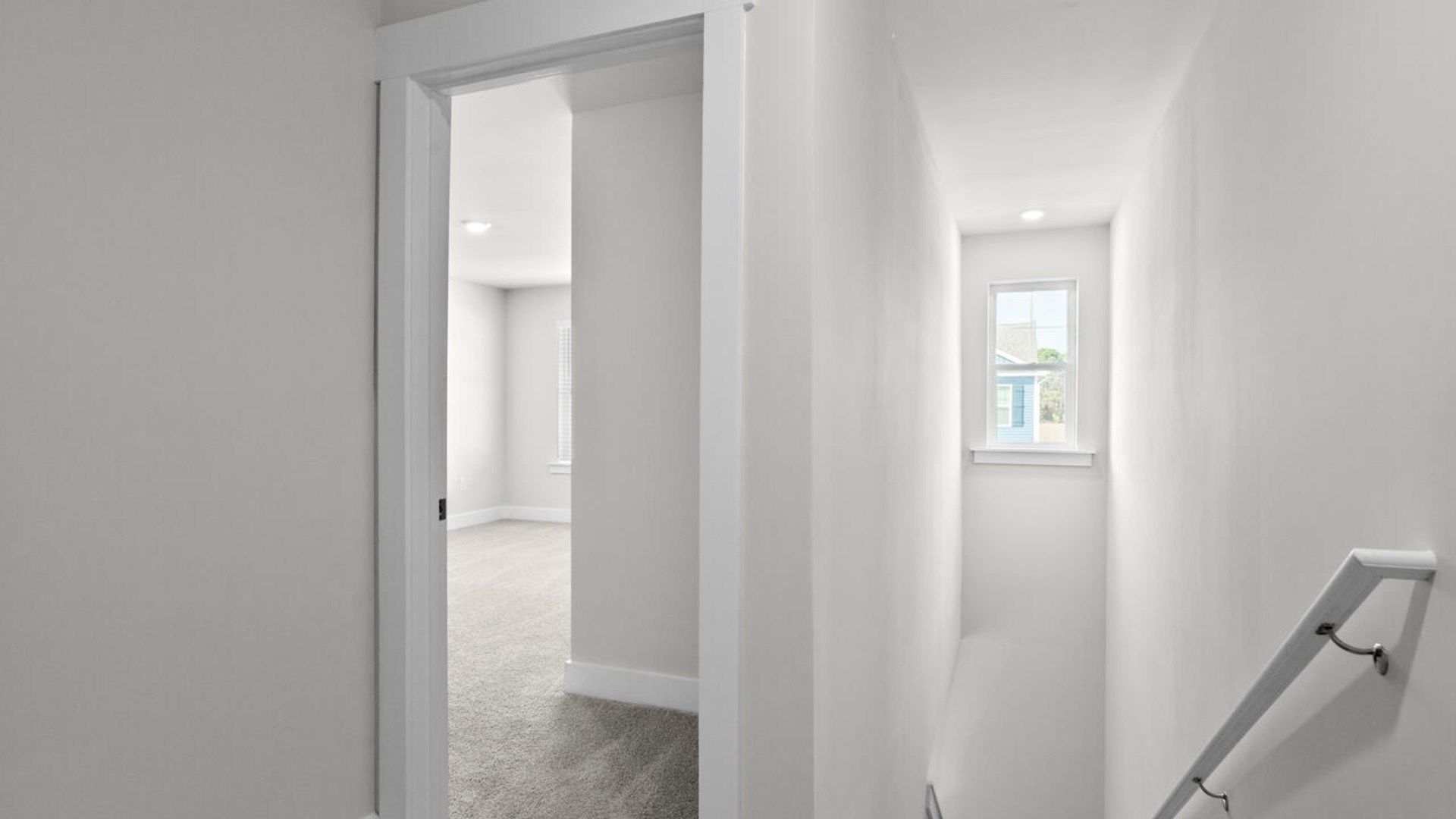 The second floor features the primary bedroom with a walk-in closet and double vanities