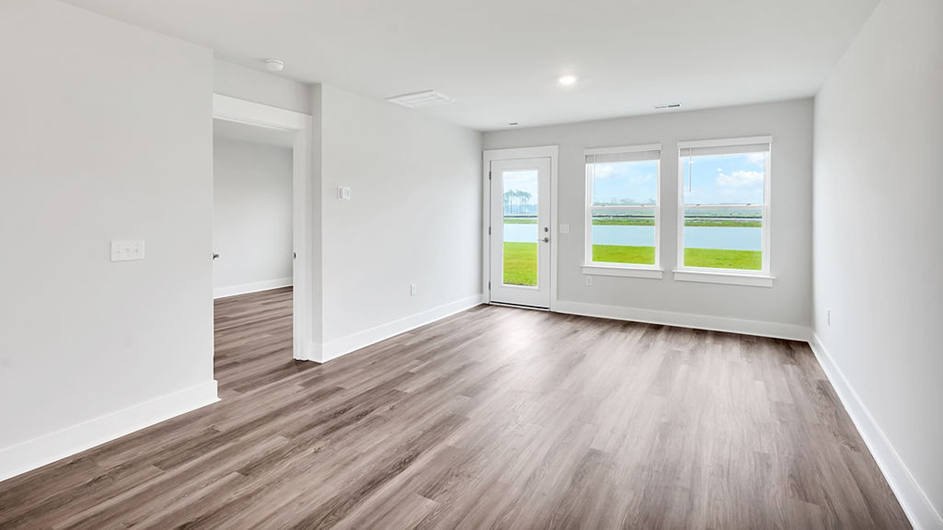 Your new Easley features an open concept first floor anchored by a spacious kitchen with a peninsula bar that overlooks your family and dining room.
