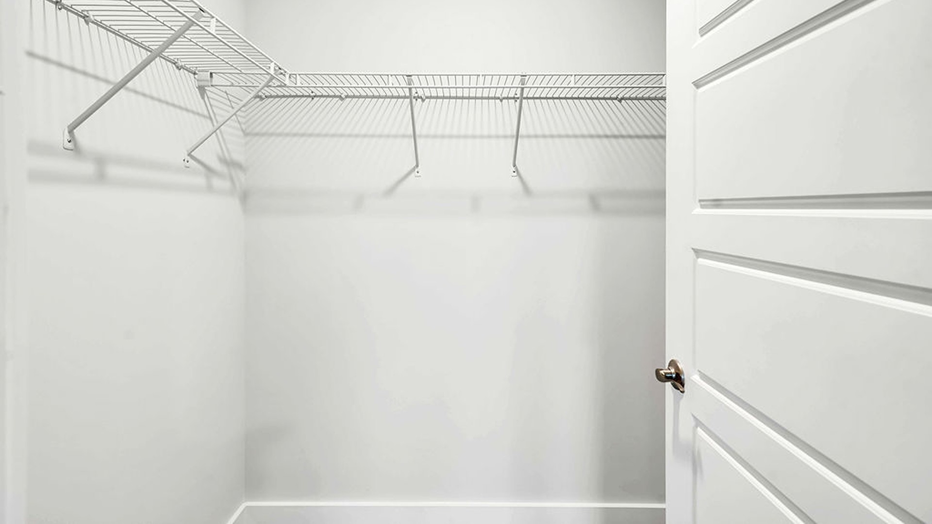 The Primary bedroom is located on the first floor with a large primary suite and bath with double vanities and walk in shower.
