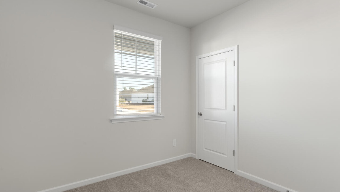 The primary bedroom has its own attached bathroom that features a walk-in closet and all the space you need to get ready in the morning. Sharing a sink isn’t a worry with the double vanity, and you also get additional privacy with a separate door for the toilet and shower.