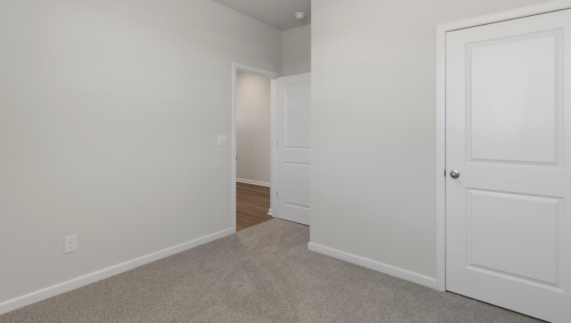 The primary bedroom has its own attached bathroom that features a walk-in closet and all the space you need to get ready in the morning. Sharing a sink isn’t a worry with the double vanity, and you also get additional privacy with a separate door for the toilet and shower.