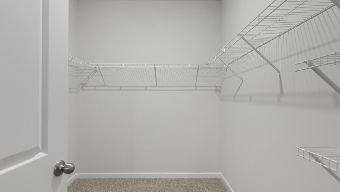 The primary bedroom has its own attached bathroom that features a walk-in closet and all the space you need to get ready in the morning. Sharing a sink isn’t a worry with the double vanity, and you also get additional privacy with a separate door for the toilet and shower.