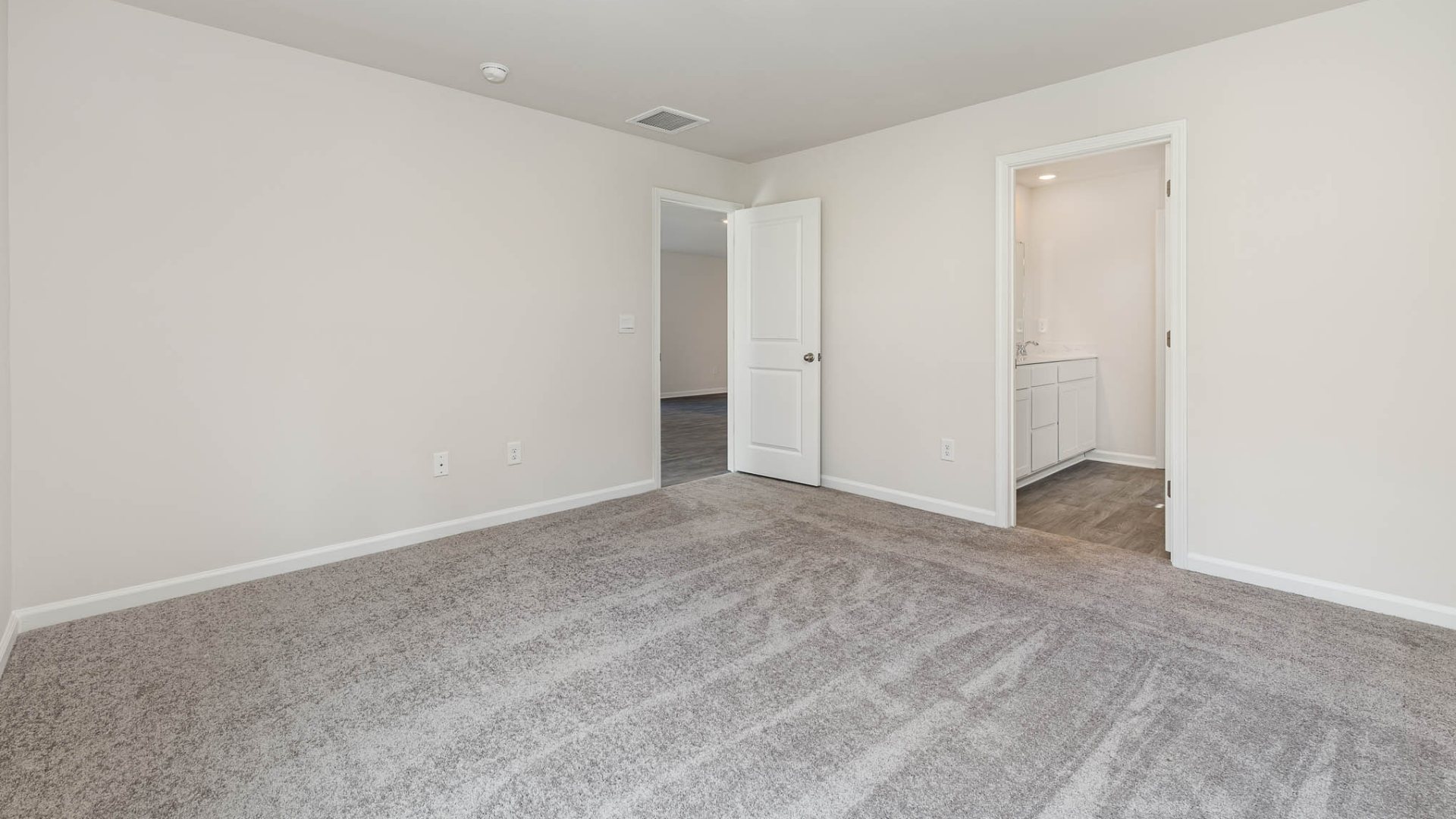 New Homes in Leland NC. The Wren is a two-story floorplan with ample living space featuring an open concept first floor with a large island overlooking the dining area and family room. The primary bedroom suite and laundry room are conveniently located on the first floor, as well.