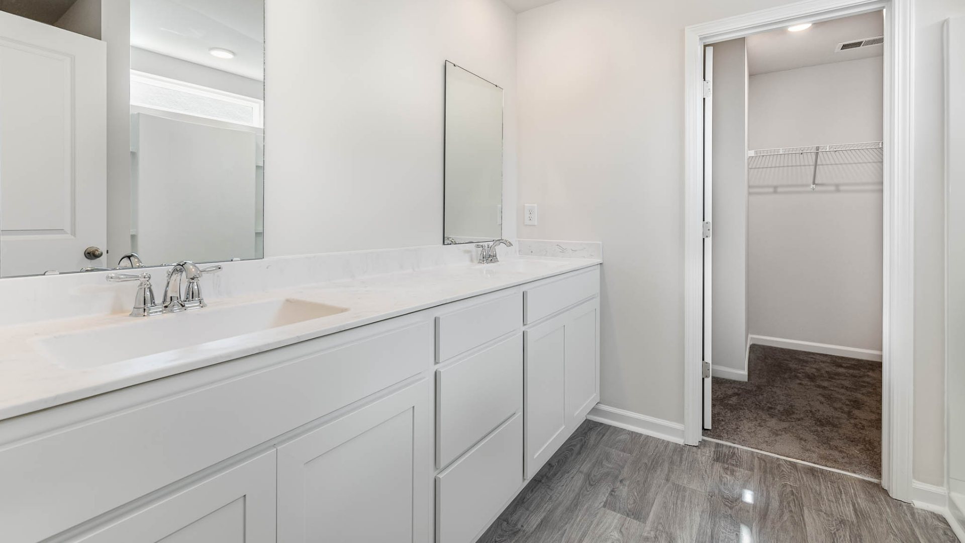 New Homes in Leland NC. The Wren is a two-story floorplan with ample living space featuring an open concept first floor with a large island overlooking the dining area and family room. The primary bedroom suite and laundry room are conveniently located on the first floor, as well.