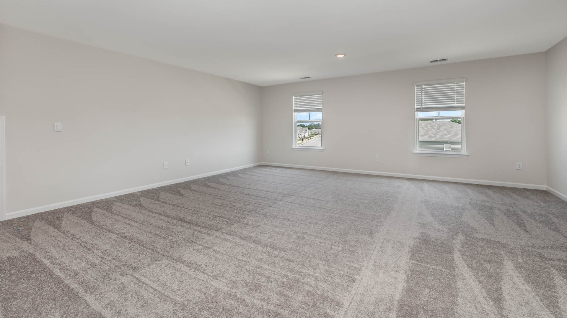 New Homes in Leland NC. The Wren is a two-story floorplan with ample living space featuring an open concept first floor with a large island overlooking the dining area and family room. The primary bedroom suite and laundry room are conveniently located on the first floor, as well.