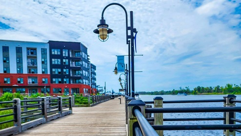 New Homes in Leland, NC. Cedar Hill Landing. Downtown Wilmington. You'll love the short commute to all the areas recreation and attractions. Love shopping and dining? You'll find all the popular shops and local eateries just a short drive away. The community features a plethora of coming soon amenities that promote a healthy and active lifestyle. From the pavilion, swimming pool, hot tub, fire pits, sport court, sand volleyball and recreation field, Cedar Hill Landing has everything you need to live your best life. The community amenities will serve as a hub for events and social gatherings, fostering a strong sense of community among residents.