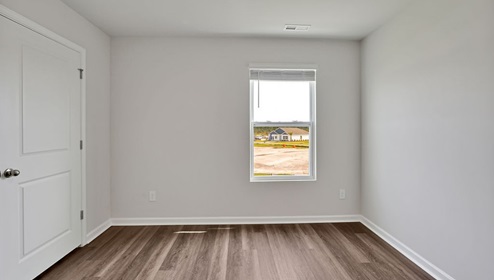 New Homes in Leland, NC. The Hayden Floorplan offers 2,511 square feet with 5 bedrooms, 3 full bathrooms, and a 2-car garage.