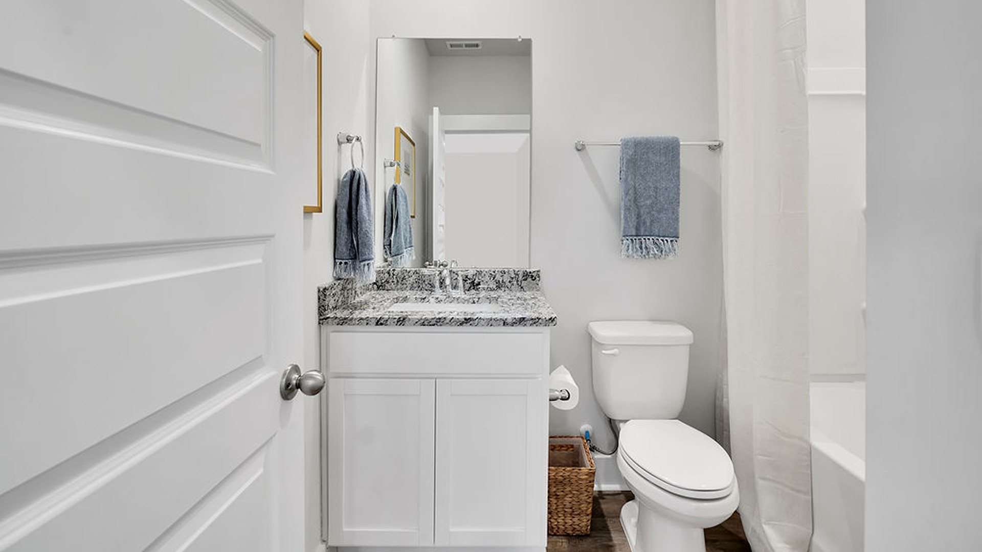 The Madison floorplan truly has it all — three-car garage, the spacious first floor features three bedrooms, including a guest ensuite, a flex room with elegant French doors, plus a bonus room and additional bedroom upstairs.