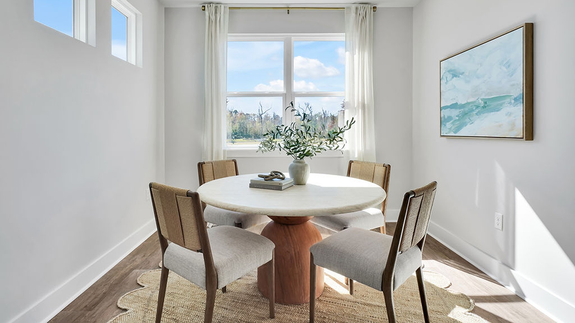 Enjoy coastal living at its best with a screened-in covered porch just off the open-concept kitchen, dining, and living areas — perfect for relaxing or entertaining.