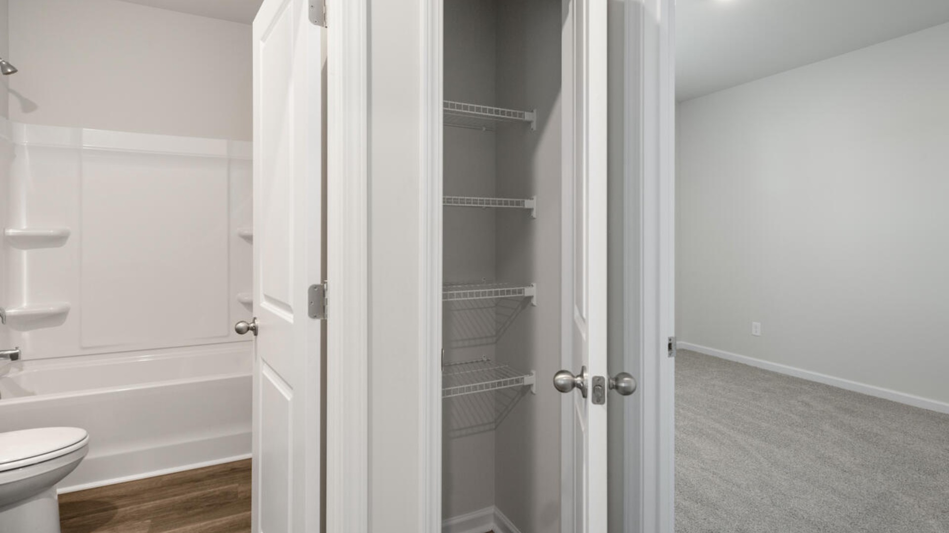 The primary suite features a step-in 5-foot shower and dual vanity. In every bedroom you’ll have carpeted floors and a closet in each room. Whether these rooms become bedrooms, office spaces, or other bonus rooms, there is sure to be comfort.