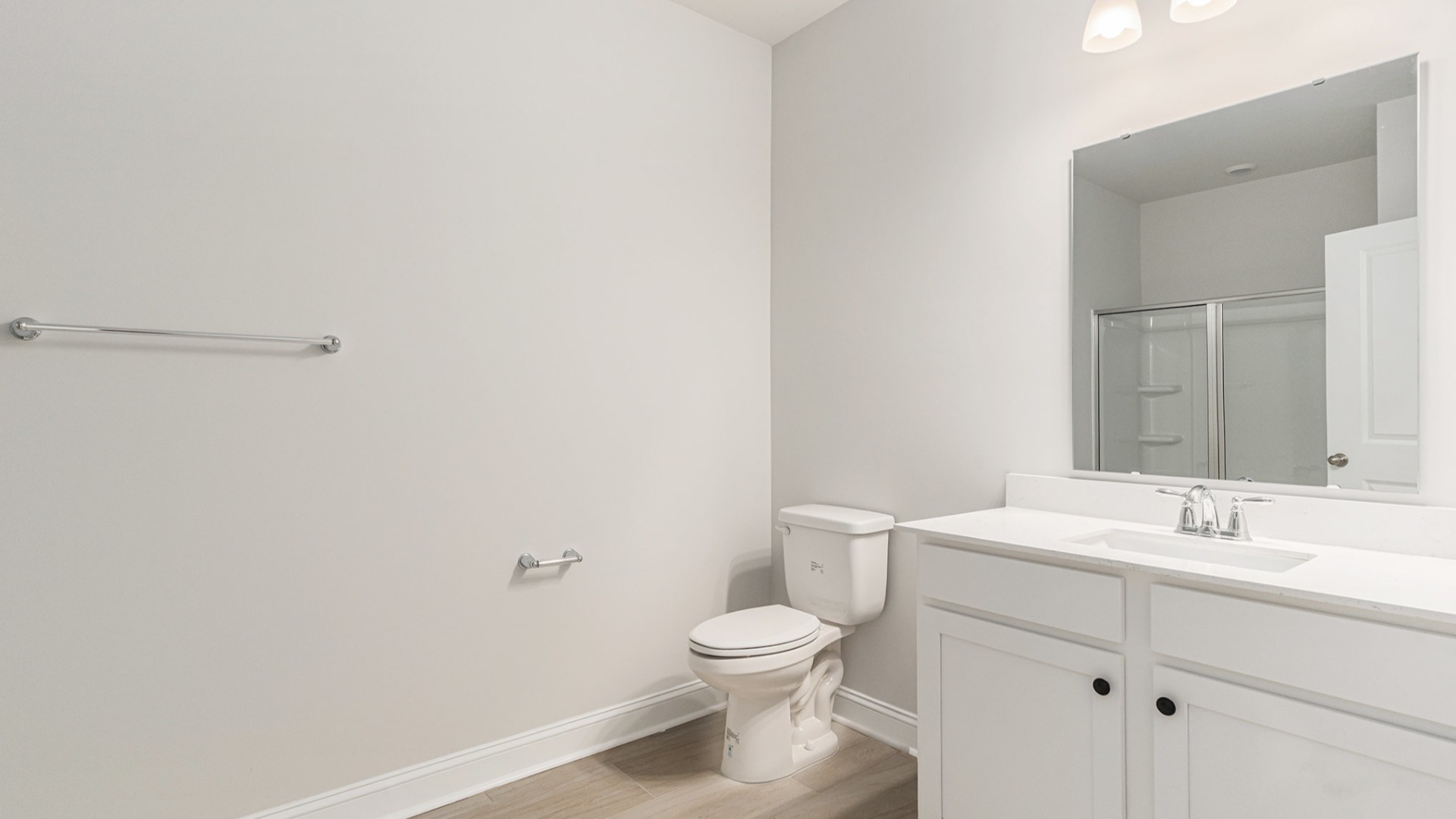 Four additional bedrooms and two full baths ensure plenty of space for family, guests, or a home office.