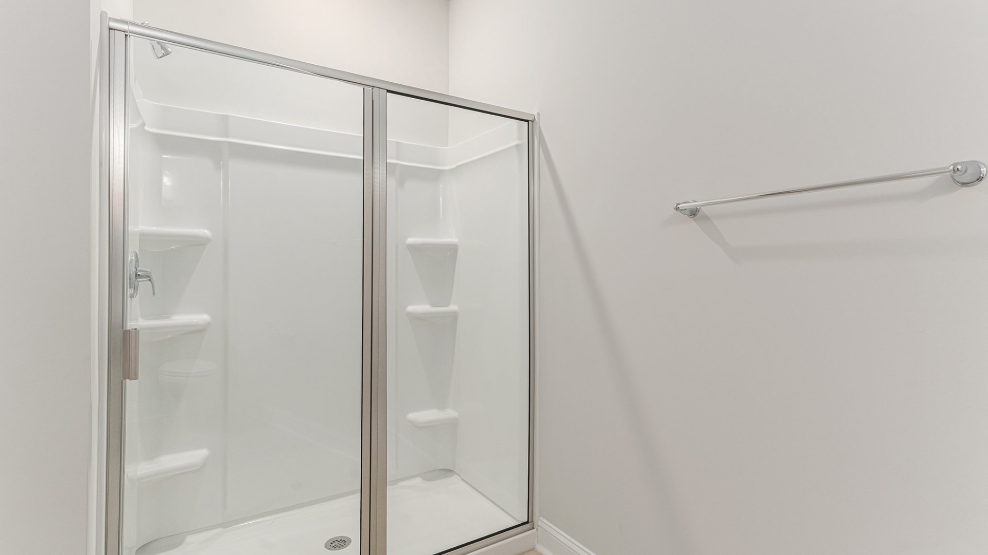 Four additional bedrooms and two full baths ensure plenty of space for family, guests, or a home office.