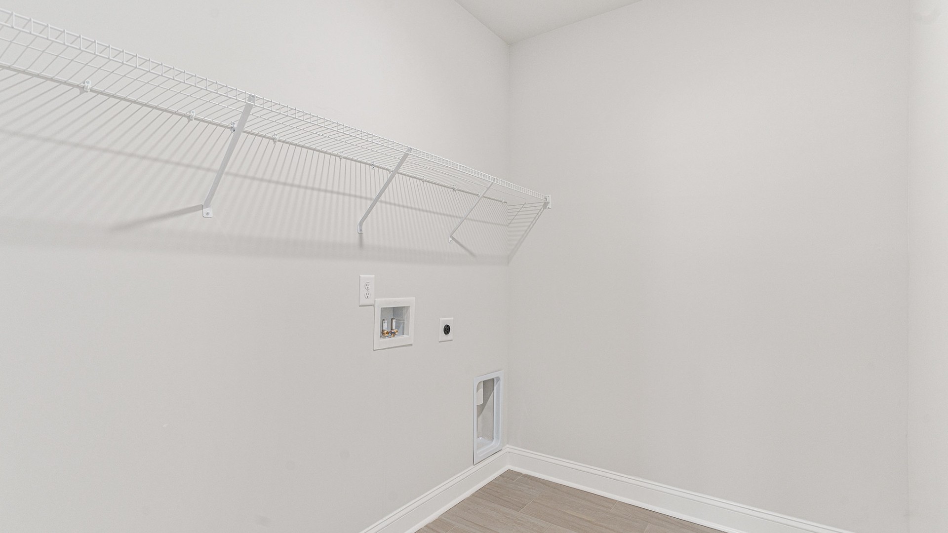 Four additional bedrooms and two full baths ensure plenty of space for family, guests, or a home office.