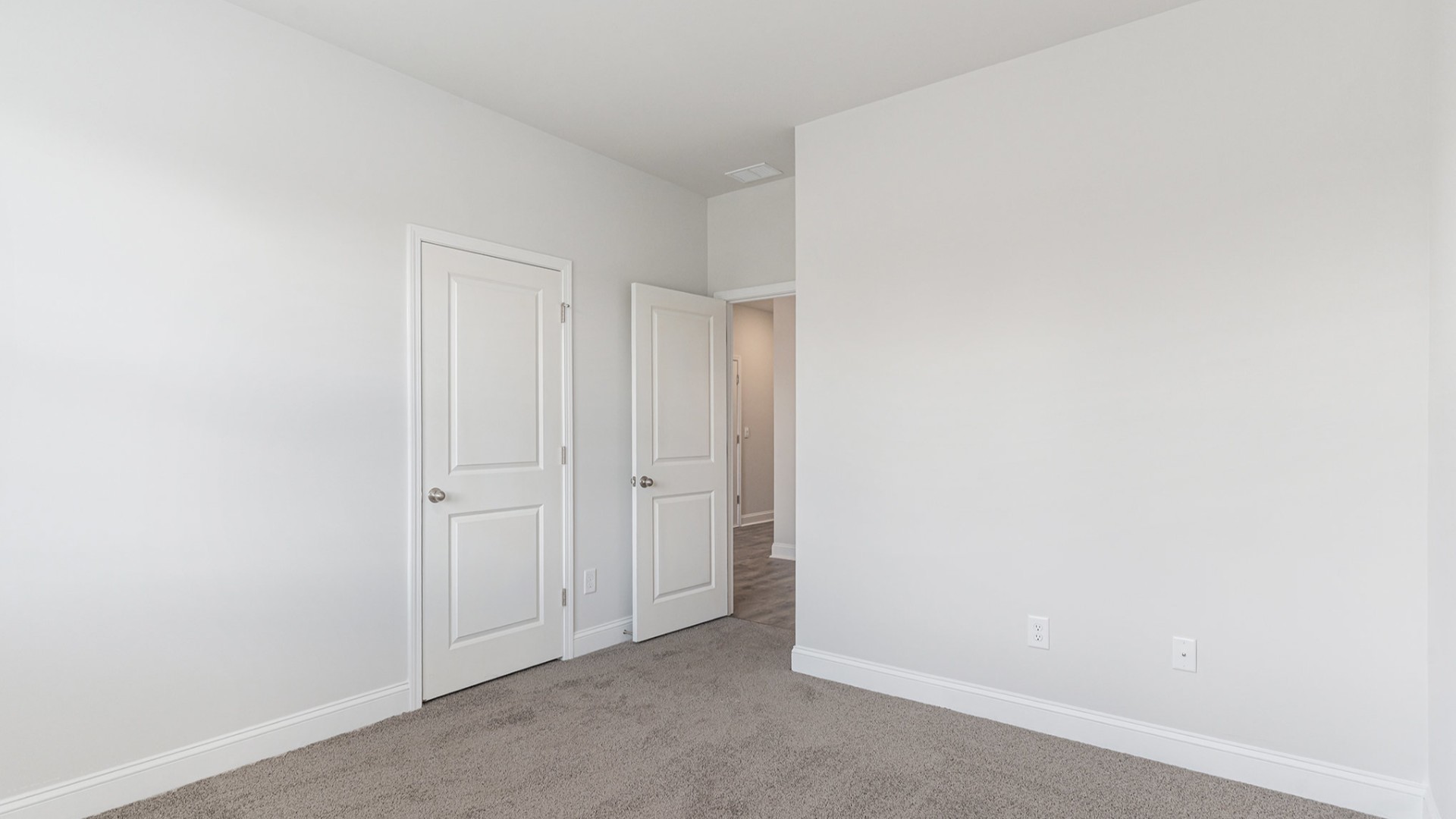 Four additional bedrooms and two full baths ensure plenty of space for family, guests, or a home office.