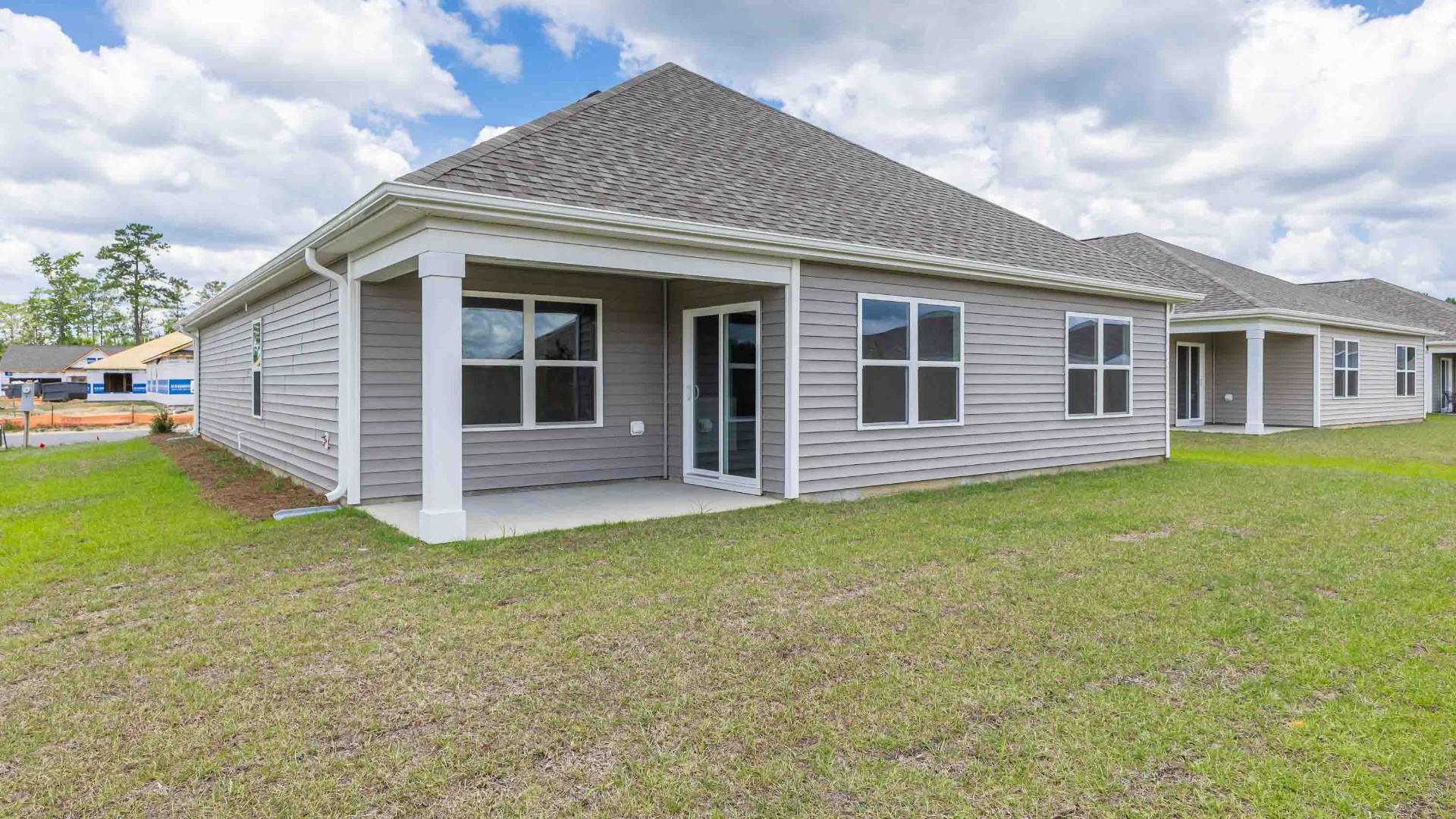 Enjoy the covered porch perfect for entertaining and enjoying the Carolina evenings.
