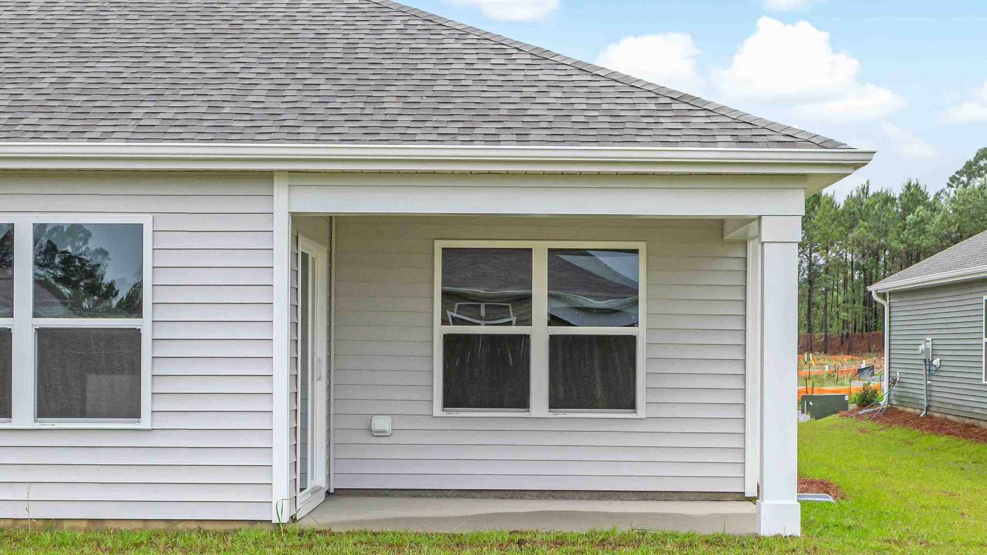 Enjoy the covered porch perfect for entertaining and enjoying the Carolina evenings.