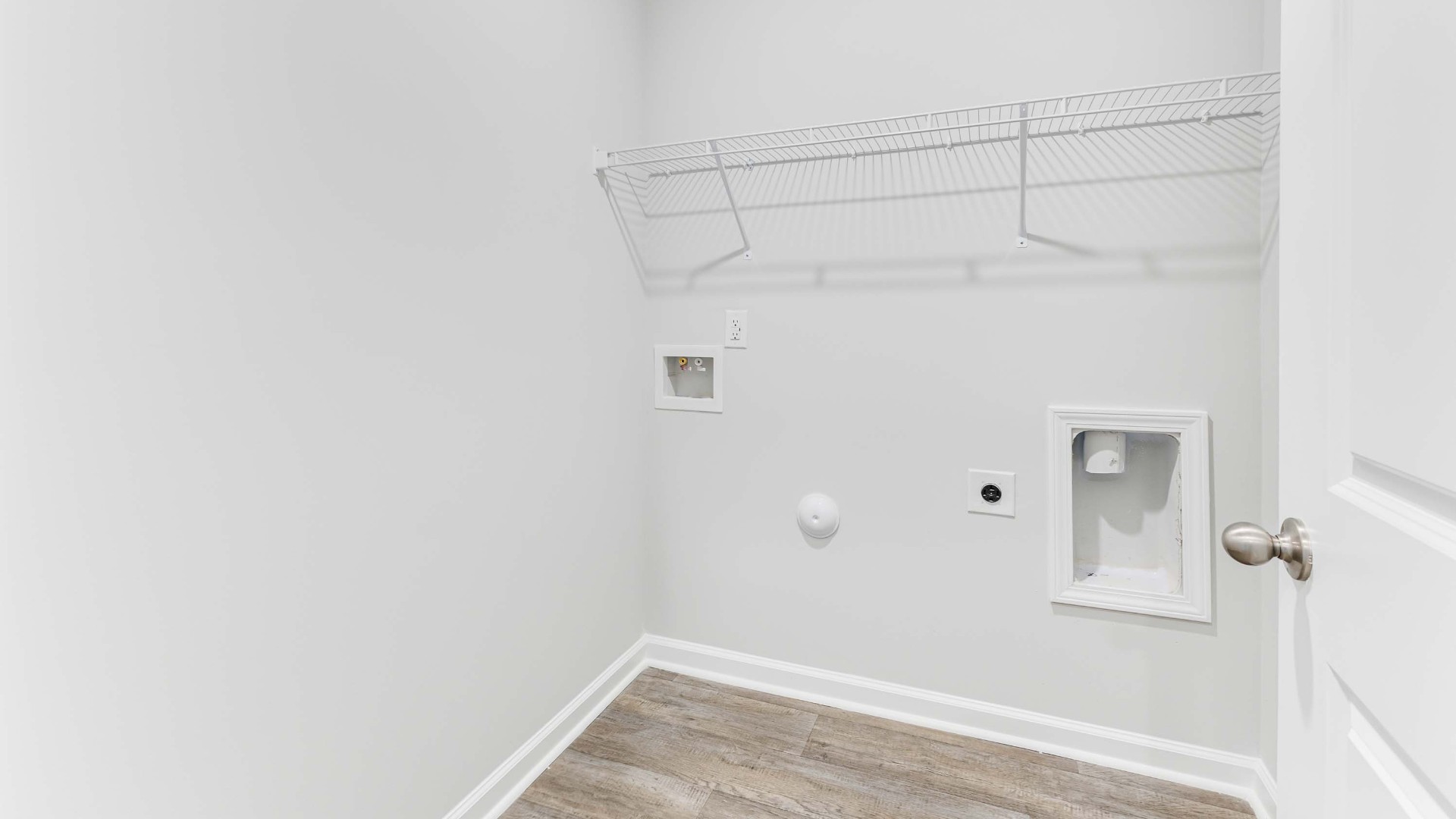The Primary Suite offers a massive closet and a luxurious bathroom with a walk-in shower, linen closet, and dual vanity.