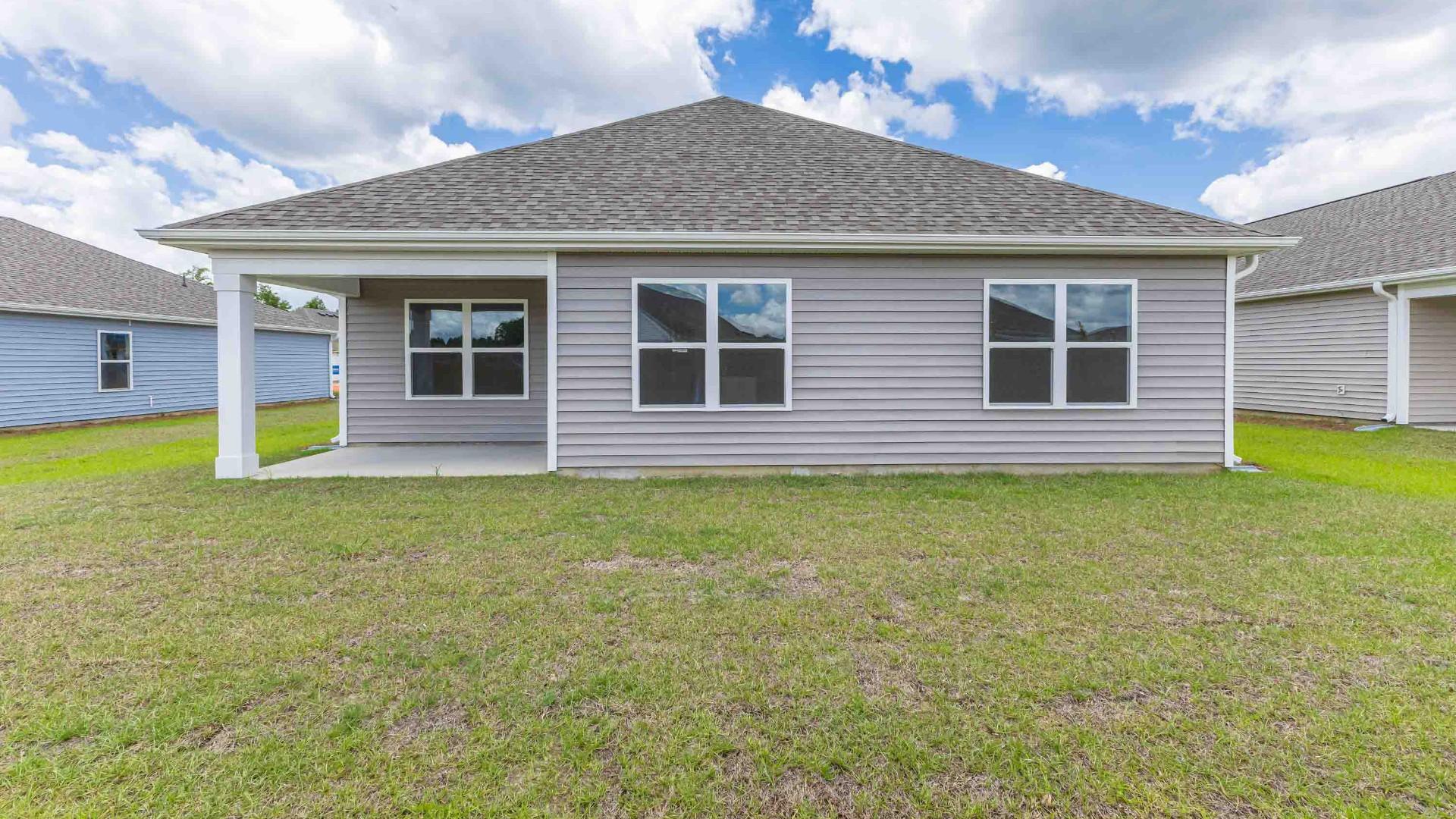 Enjoy the covered porch perfect for entertaining and enjoying the Carolina evenings.