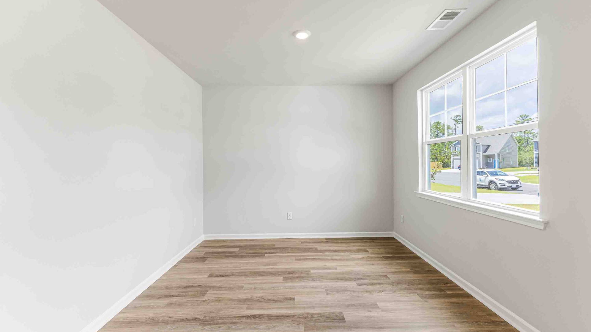 Downstairs, a flex room can be used as an office or sitting area. I