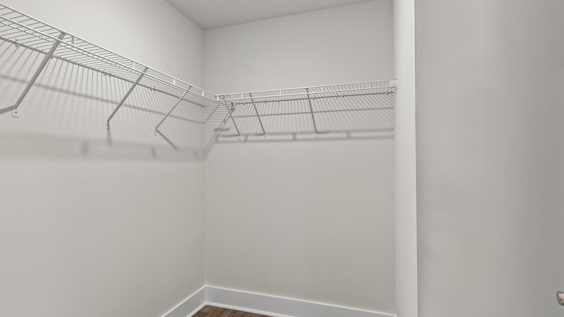 Downstairs is the primary bedroom has its own attached bathroom that features a walk-in closet and all the space you need to get ready in the morning.