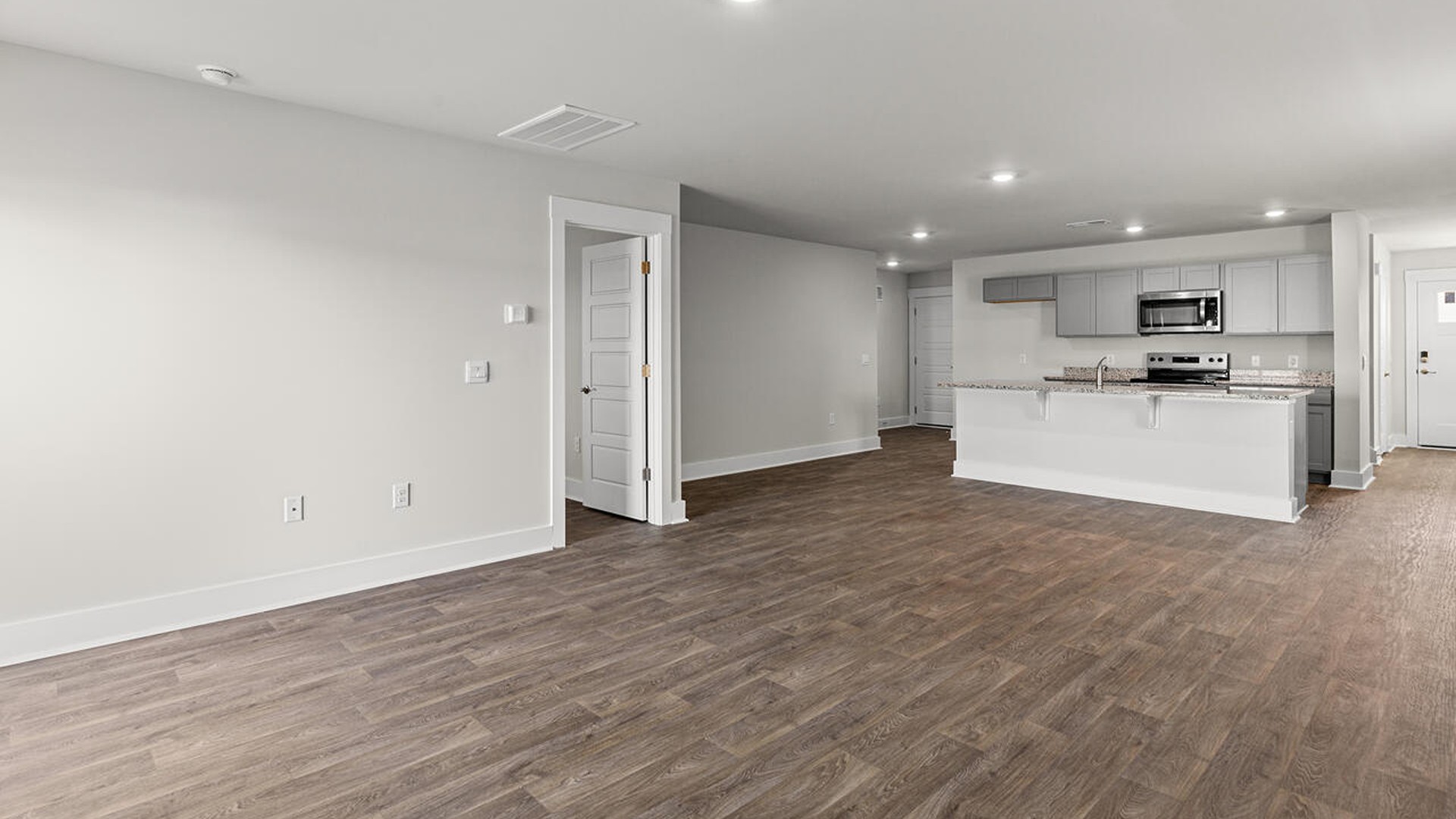 The living area is an open concept, where your kitchen, living, and dining areas blend seamlessly into a space perfect for everyday living and entertaining.