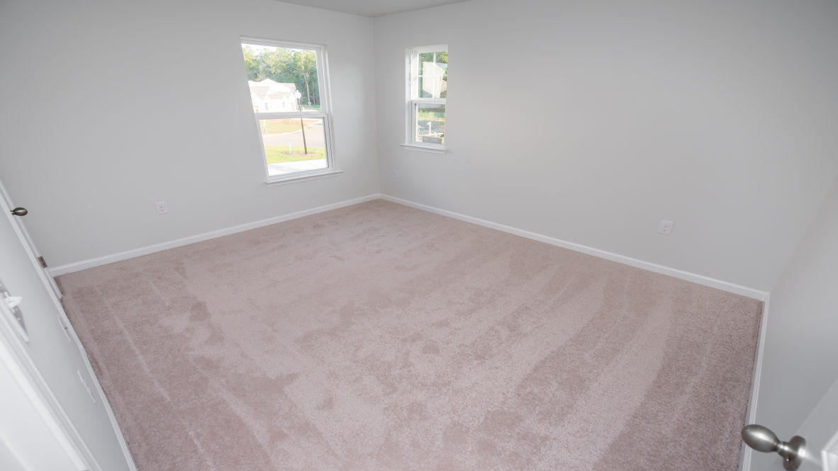 The upstairs provides an additional open living room. The second floor is spacious and includes four additional bedrooms and a convenient laundry room.