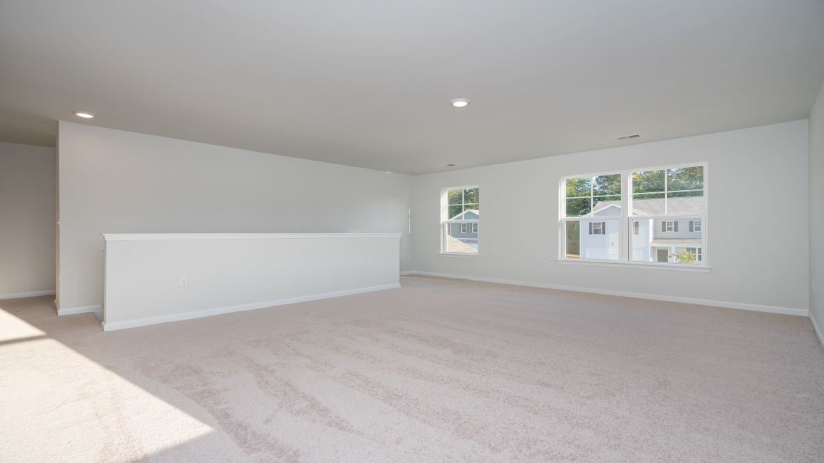 The upstairs provides an additional open living room. The second floor is spacious and includes four additional bedrooms and a convenient laundry room.