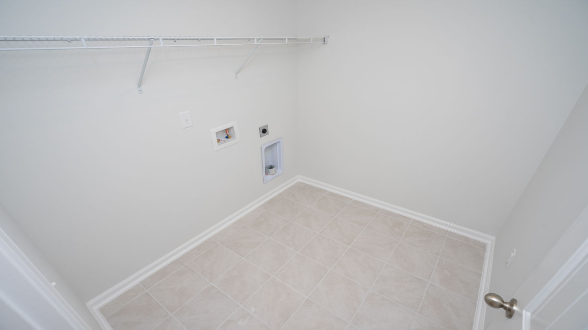 The upstairs provides an additional open living room. The second floor is spacious and includes four additional bedrooms and a convenient laundry room.