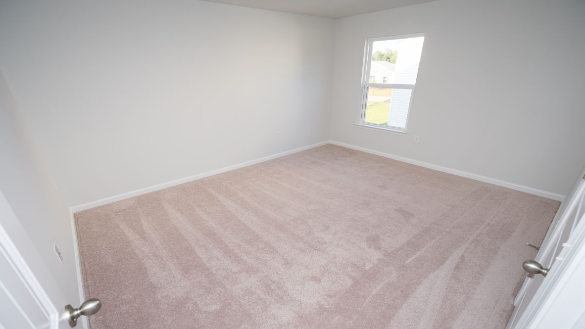 The upstairs provides an additional open living room. The second floor is spacious and includes four additional bedrooms and a convenient laundry room.
