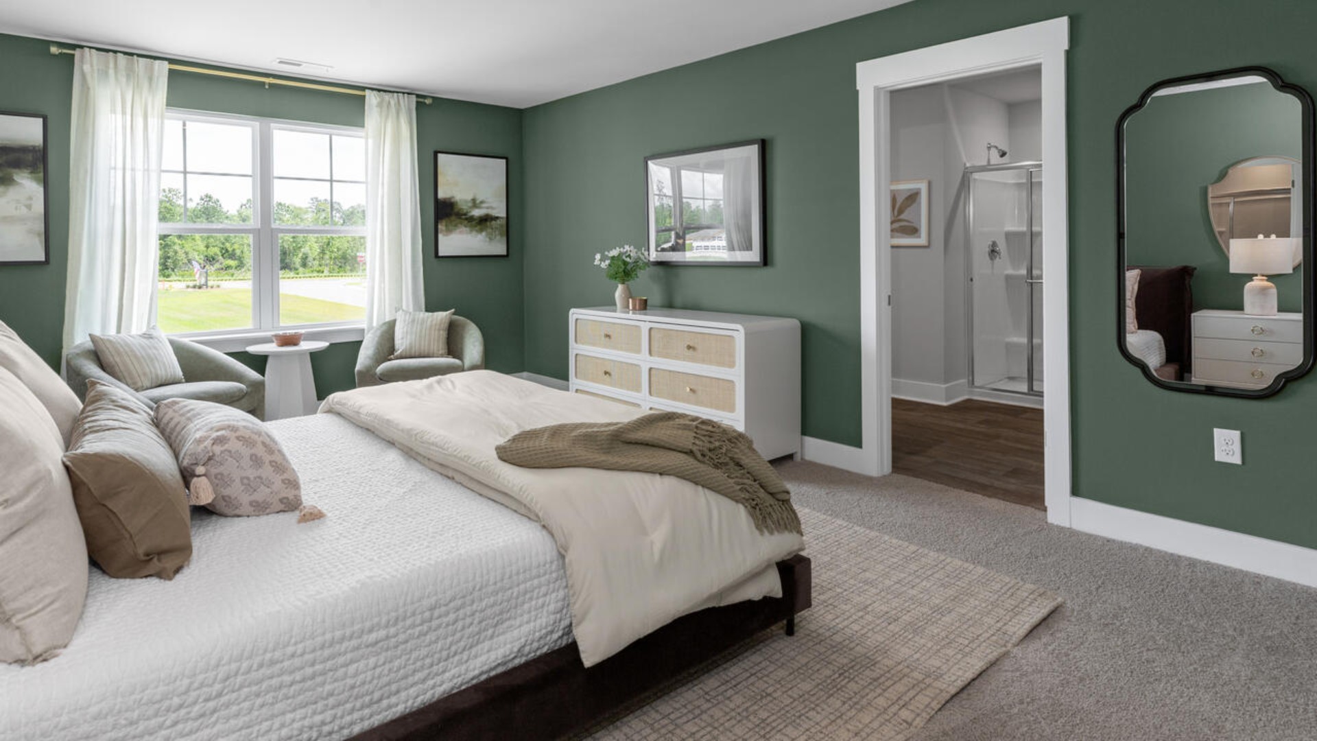 The upstairs has an additional living space, a laundry room, and a Primary Bedroom.