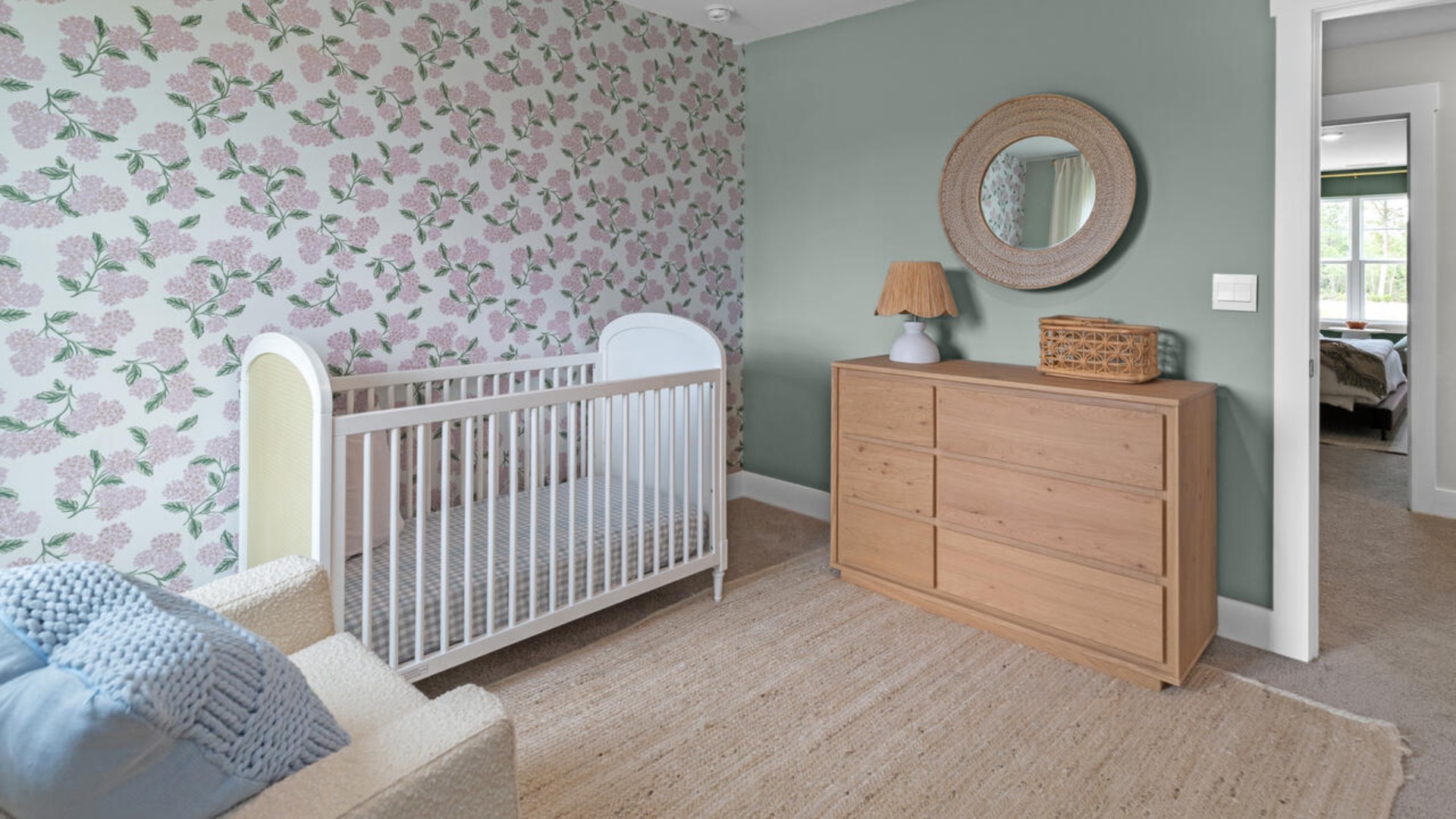 The upstairs has an additional living space, a laundry room, and a Primary Bedroom.