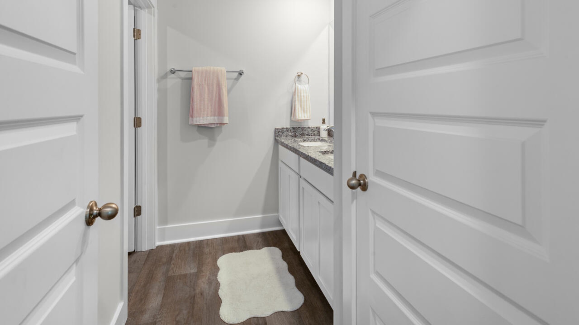 The upstairs has an additional living space, a laundry room, and a Primary Bedroom. Downstairs, a flex room can be used as an office or sitting area. In every bedroom you’ll have carpeted floors and a closet in each room. Whether these rooms become bedrooms, office spaces, or other bonus rooms, there is sure to be comfort.